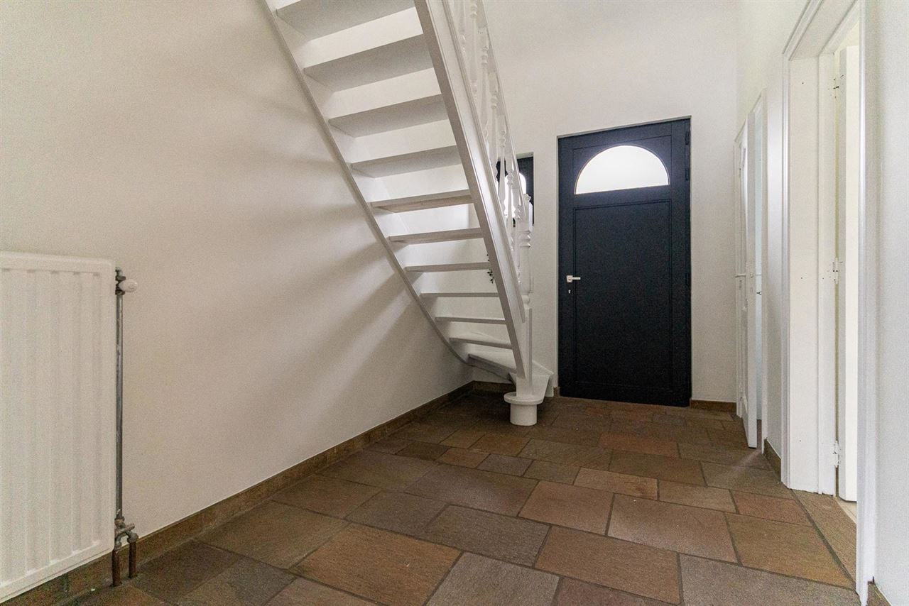 276 m² wooncomfort op 1.025 m² in hartje Melsele