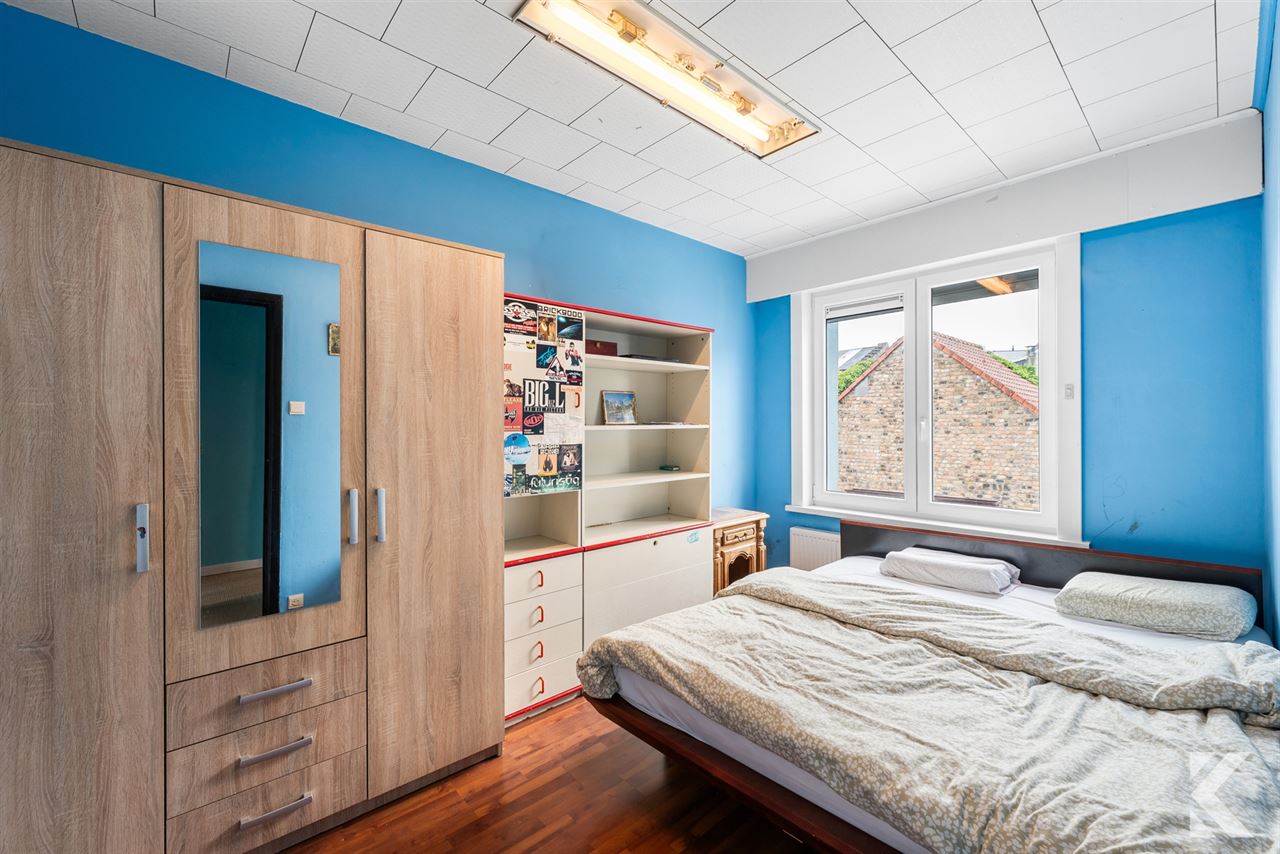 Volledig gerenoveerde woning met 3 slpk, 2 bdk,zonnige koer