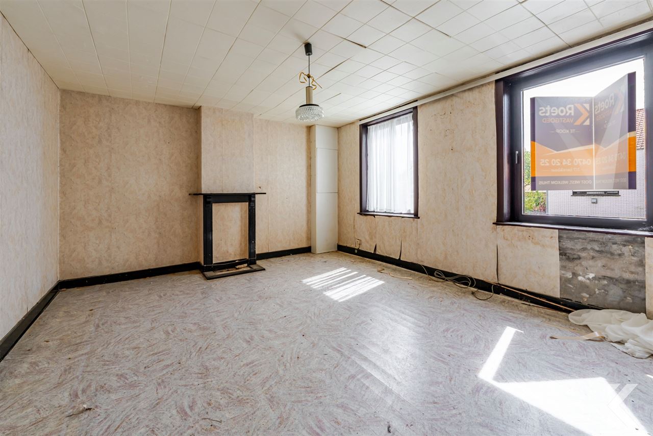Te renoveren woning met veel potentieel en ruime zolder