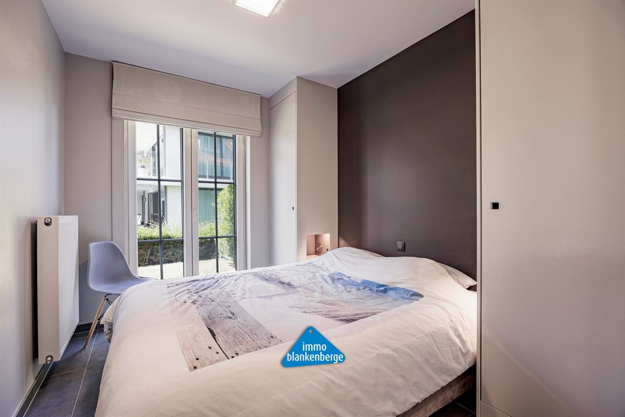 Luxe afgewerkt 2‑slaapkamerappartement met tuin in De Haan