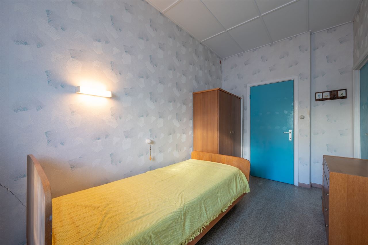 Grote gezinswoning met tuin en 7 slaapkamers nabij centrum en zee