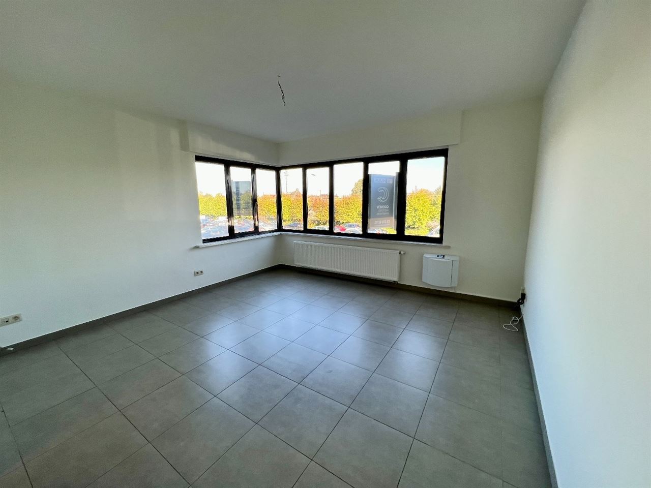 Ruim duplex-appartement met 1 slpk en bew. opp. van 70 m² op centrale ligging te Lier!