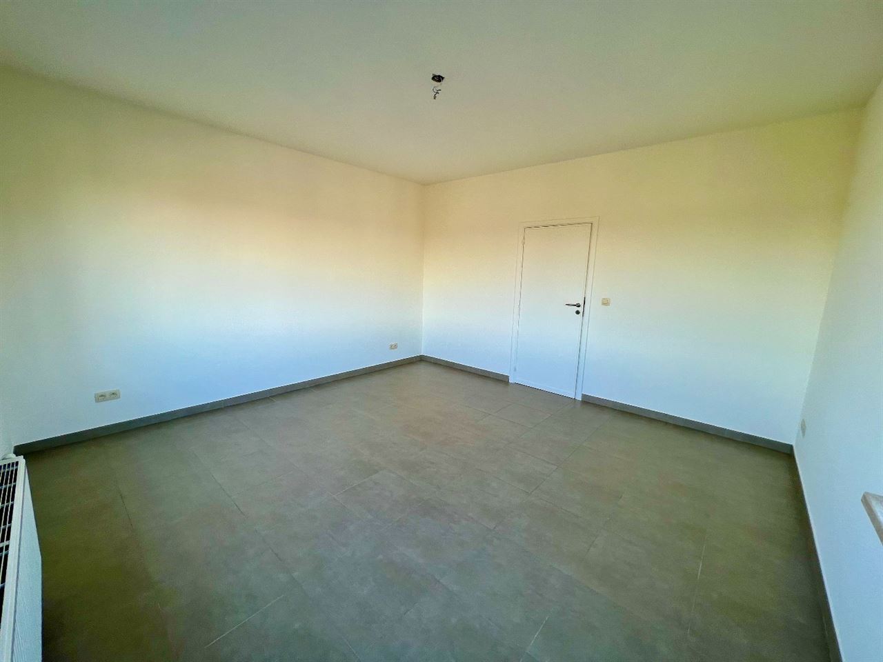 Ruim duplex-appartement met 1 slpk en bew. opp. van 70 m² op centrale ligging te Lier!