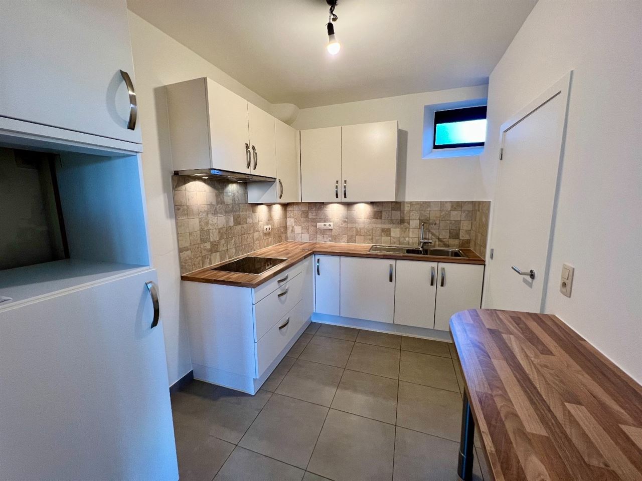 Ruim duplex-appartement met 1 slpk en bew. opp. van 70 m² op centrale ligging te Lier!