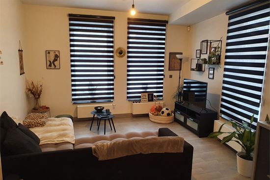 Verzorgd instapklaar 1 slk appartement met terras en staanplaats.