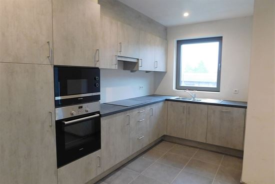Te huur nieuwbouw appartement, 2 slks, lift, carport, fiets- en kelderberging.