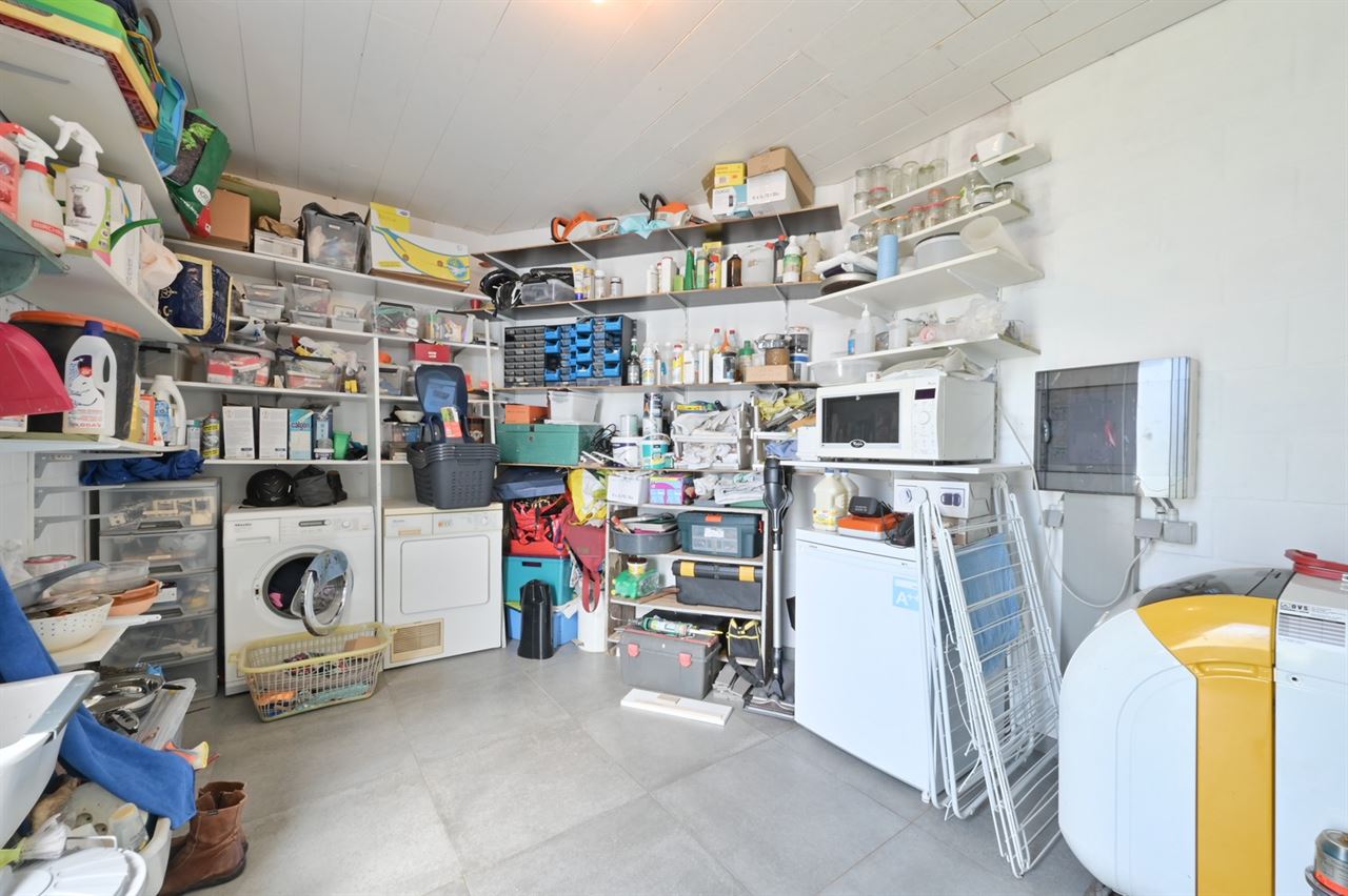 Instapklare open bebouwing met praktijkmogelijkheid, 3 à 4 slaapkamers en zonnige tuin