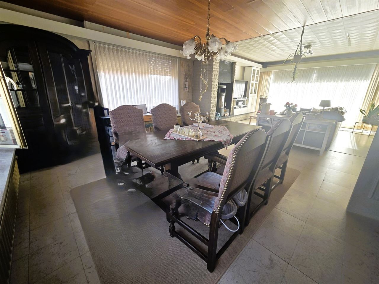 Woonhuis met aangebouwd werkatelier of polyvalante ruimte en garage aanbouwen