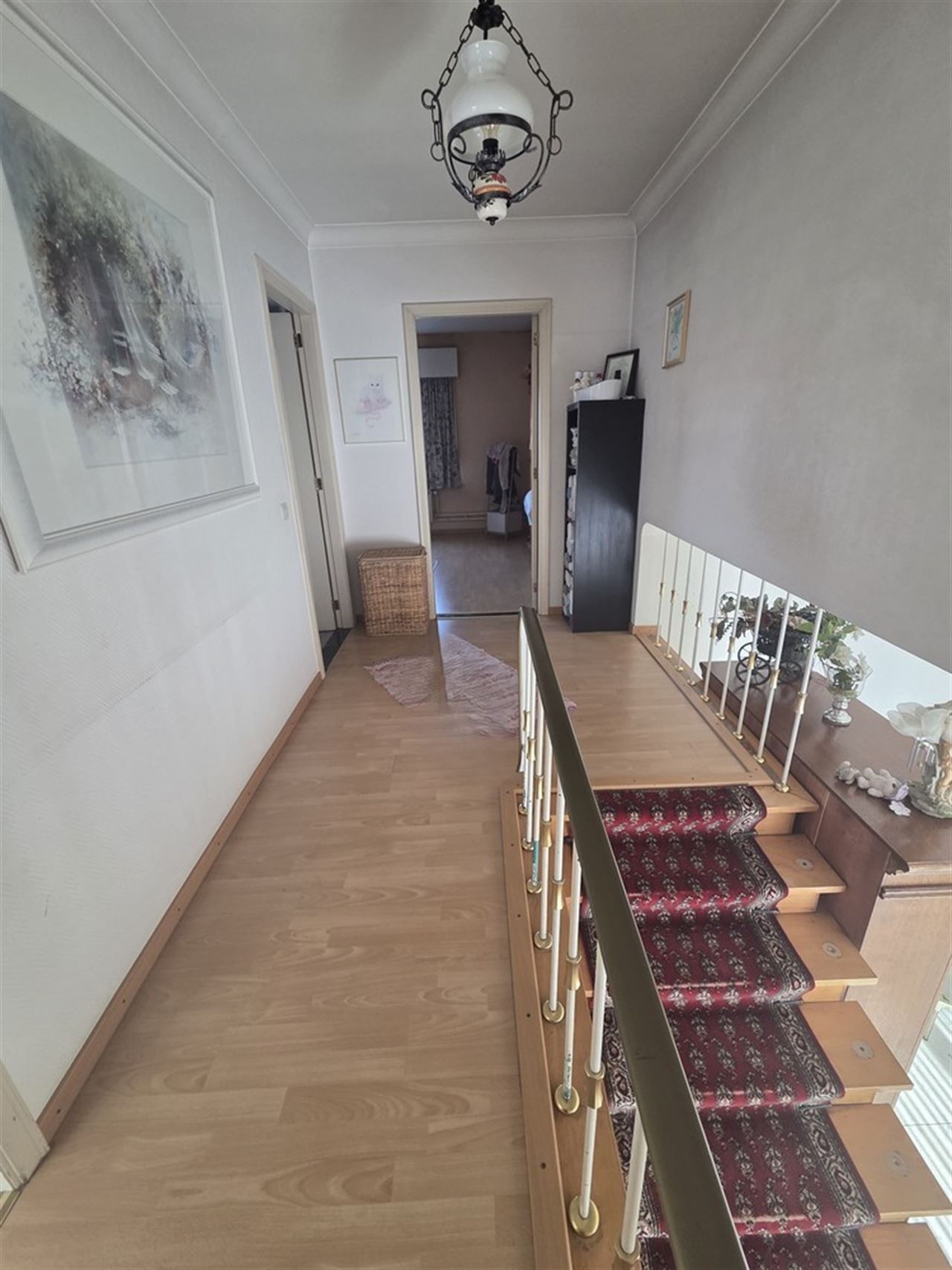 Woonhuis met aangebouwd werkatelier of polyvalante ruimte en garage aanbouwen