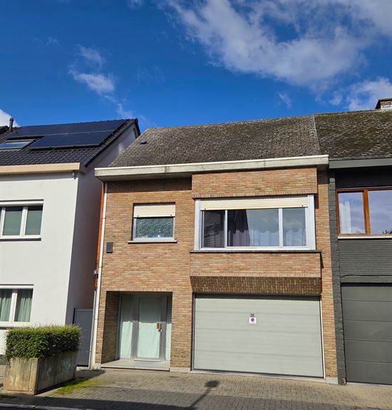 Instapklare gezellige woning met diepe tuin en garage