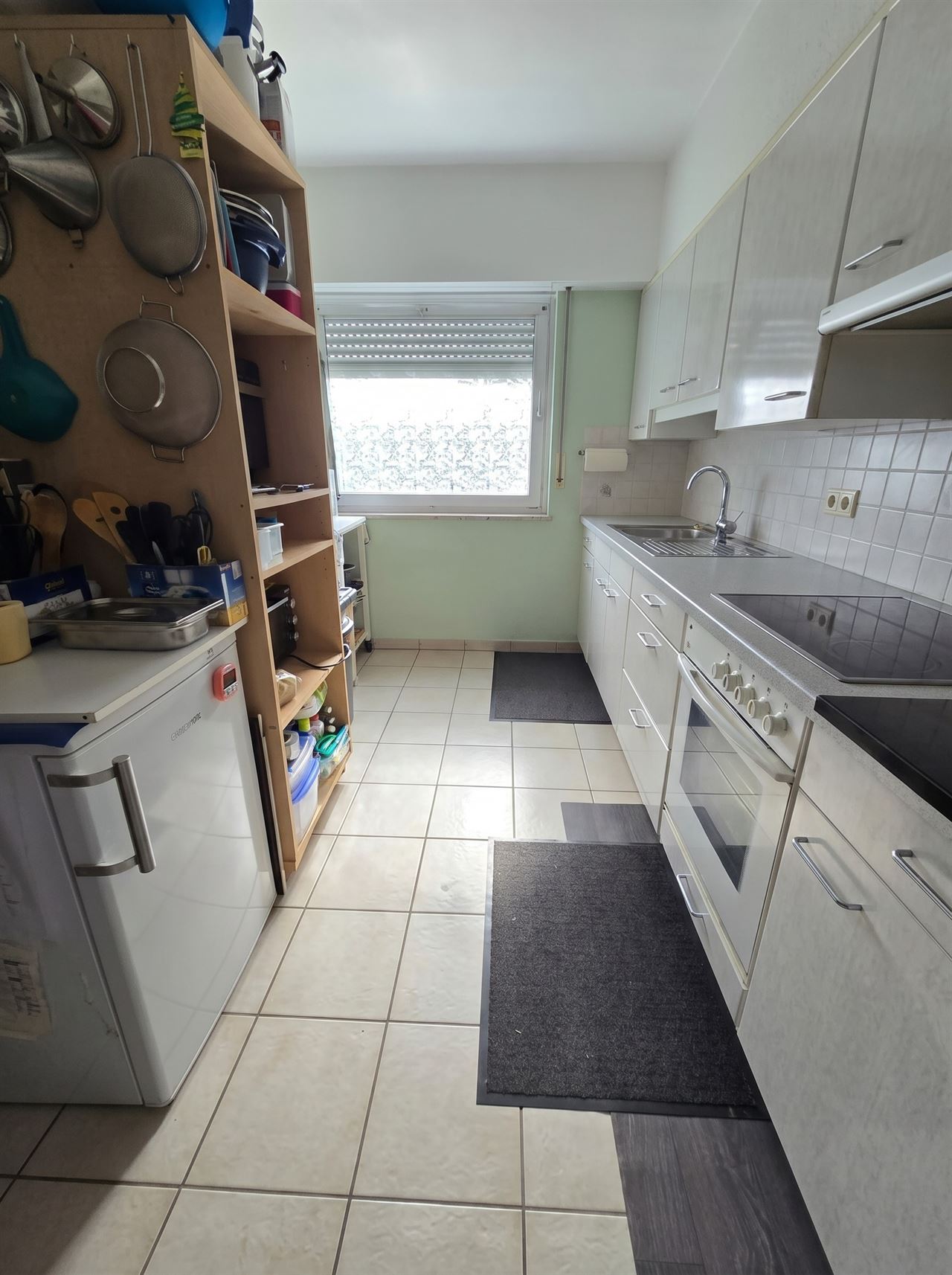Instapklare gezellige woning met diepe tuin en garage