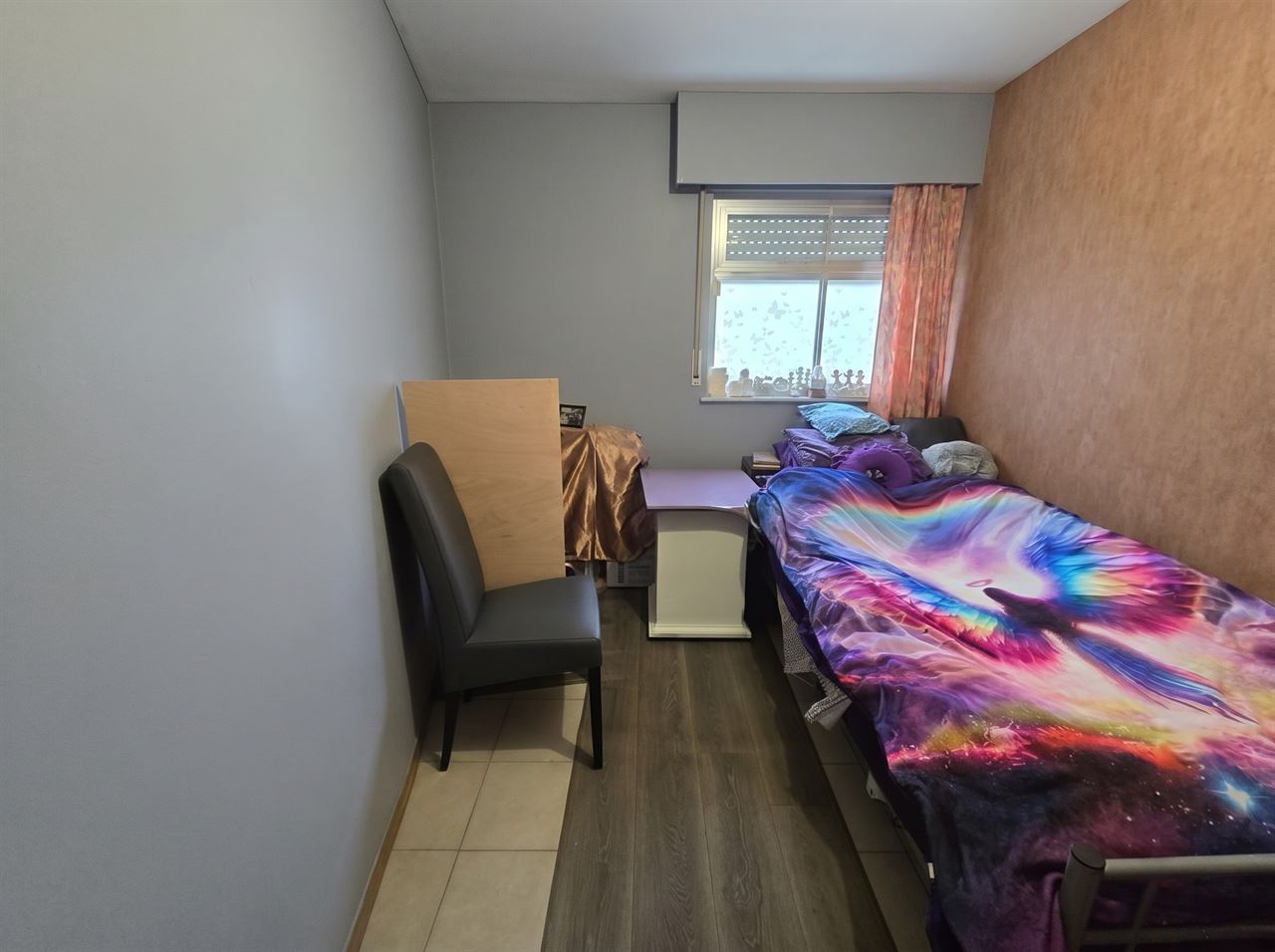 Instapklare gezellige woning met diepe tuin en garage