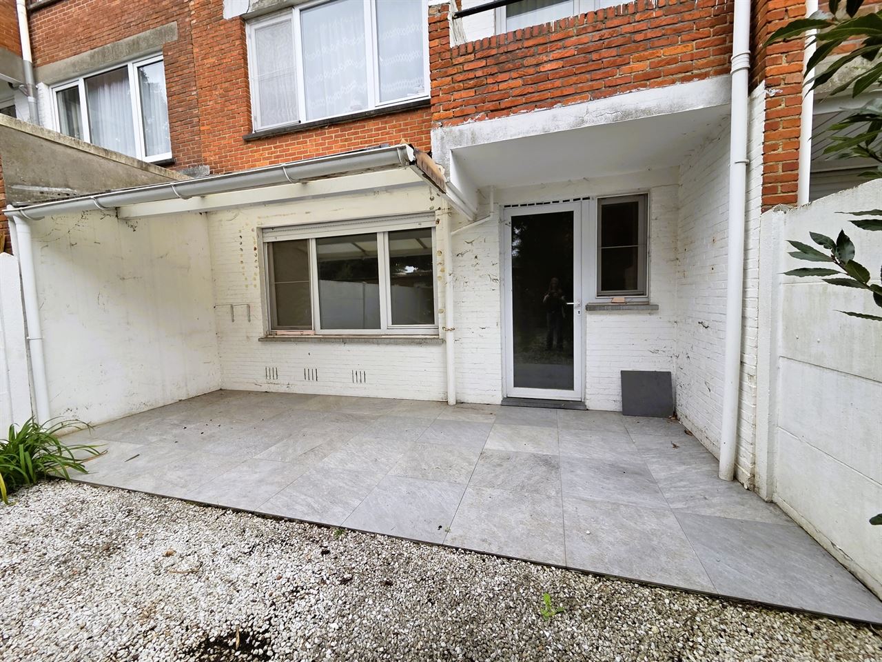 Instapklaar gelijkvloers appartement met zonnige tuin