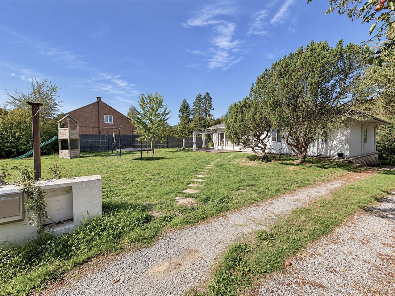 Plain-pied sur 14 ares avec garage et caves