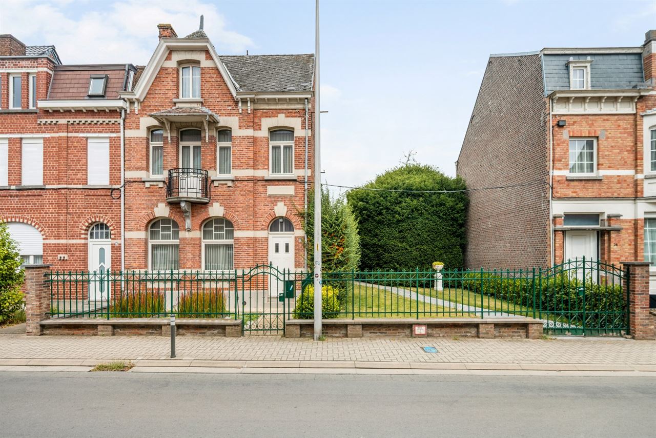 Authentieke woning met potentiële bouwgrond in centrum Opwijk