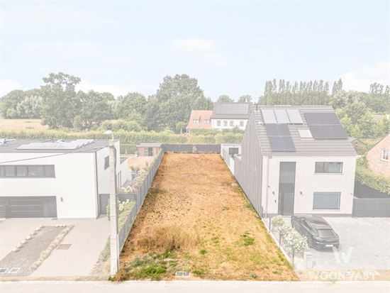 Bouwgrond 465 m² – halfopen bebouwing