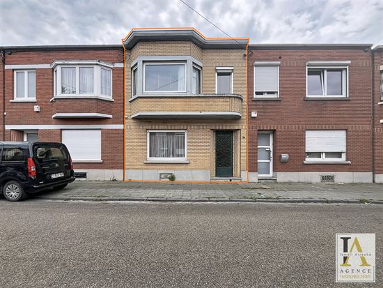 Maison unifamiliale à rénover avec jardin
