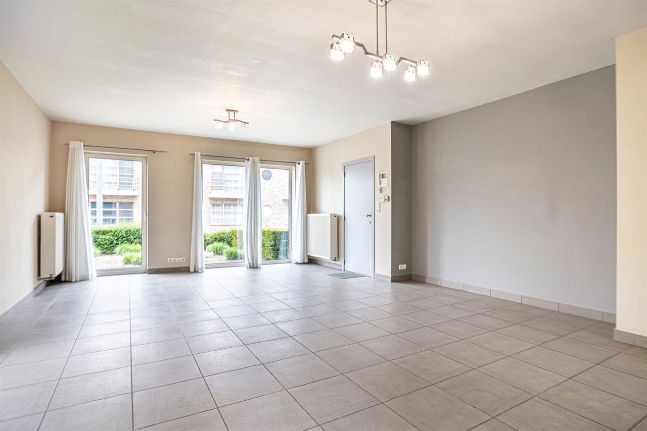 Gelijkvloerse verInstapklaar gelijkvloers appartement met privatieve tuindieping