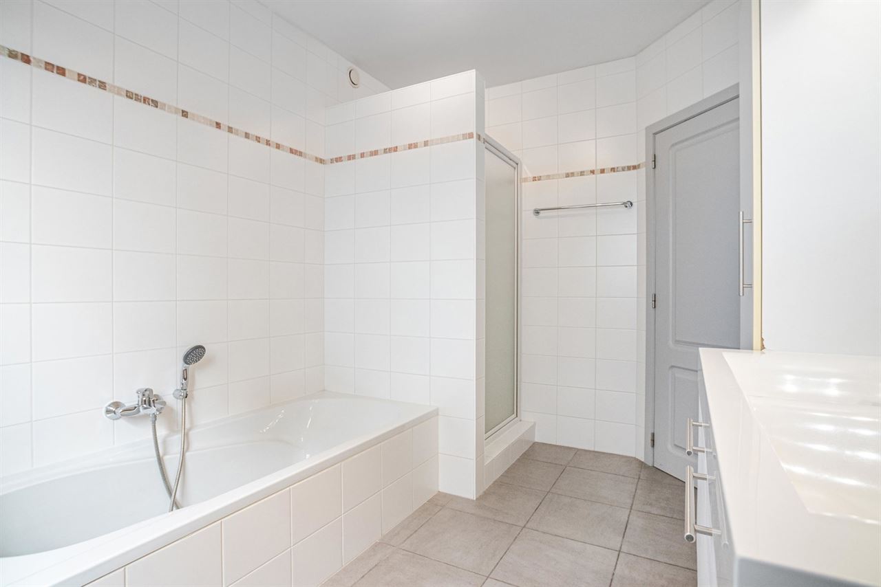Gelijkvloerse verInstapklaar gelijkvloers appartement met privatieve tuindieping