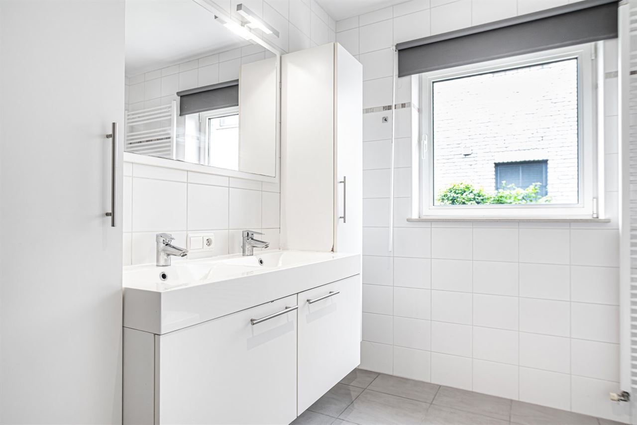 Gelijkvloerse verInstapklaar gelijkvloers appartement met privatieve tuindieping