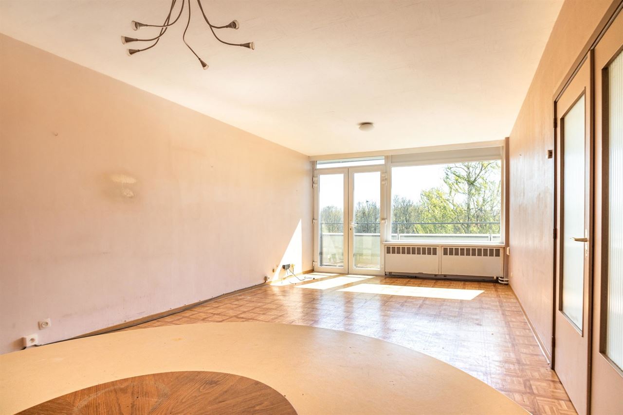 Ruim 3-slaapkamerappartement met potentieel + garage