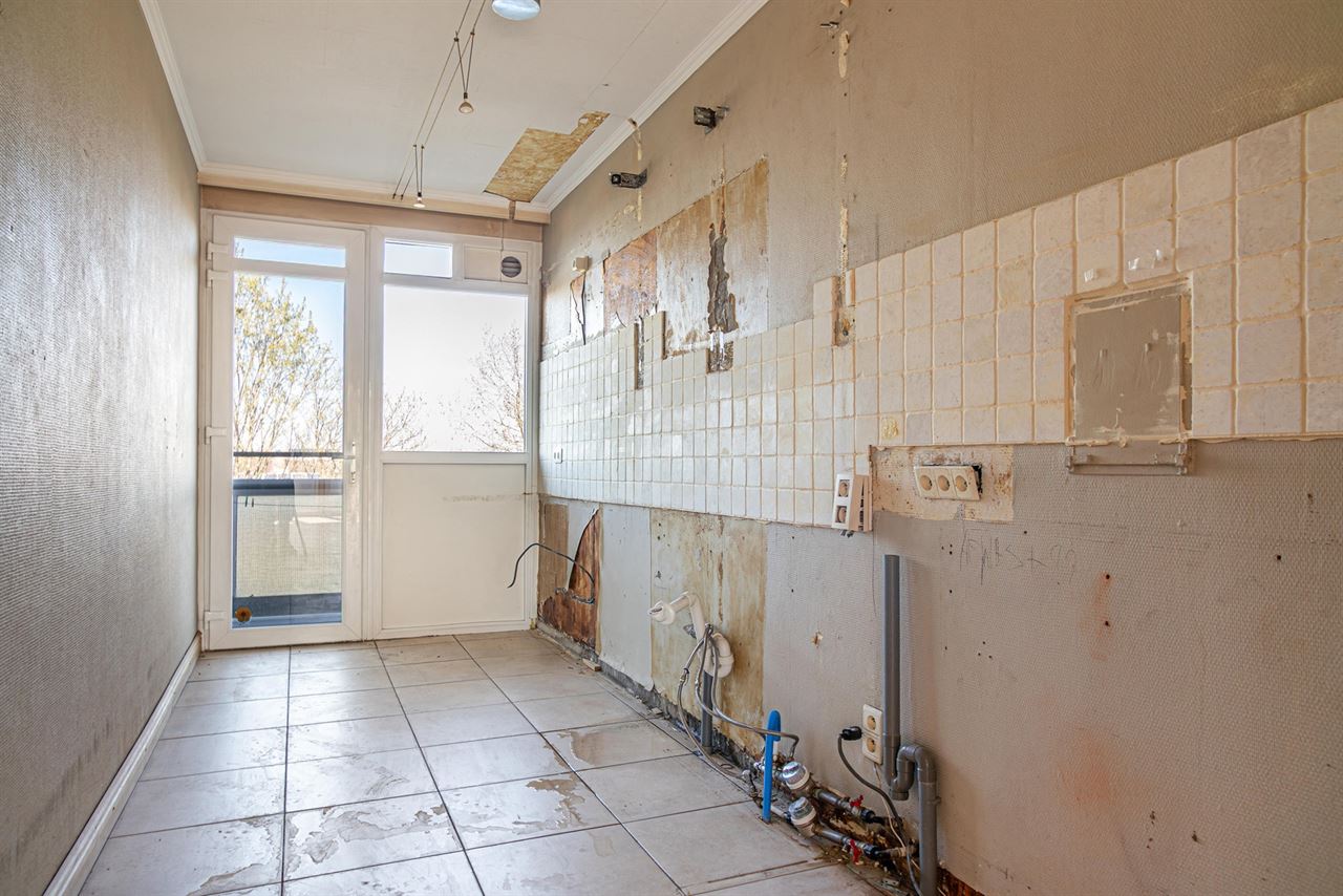 Ruim 3-slaapkamerappartement met potentieel + garage