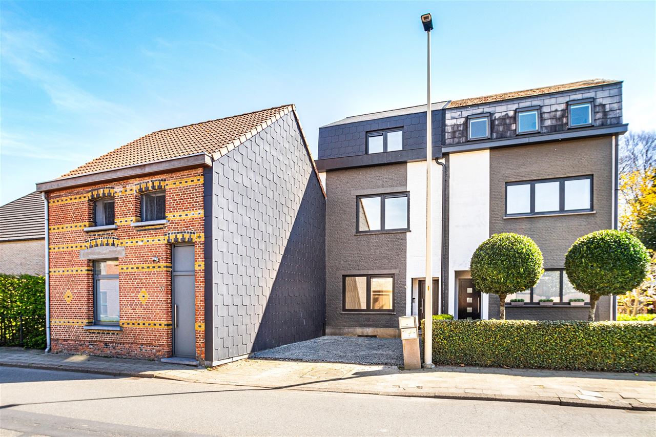 Stijlvol gerenoveerde woning met ZO-tuin in Hove