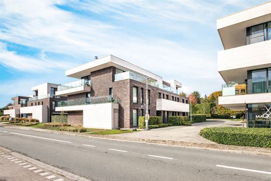 Lichtrijk gelijkvloers appartement met terras en tuinzicht