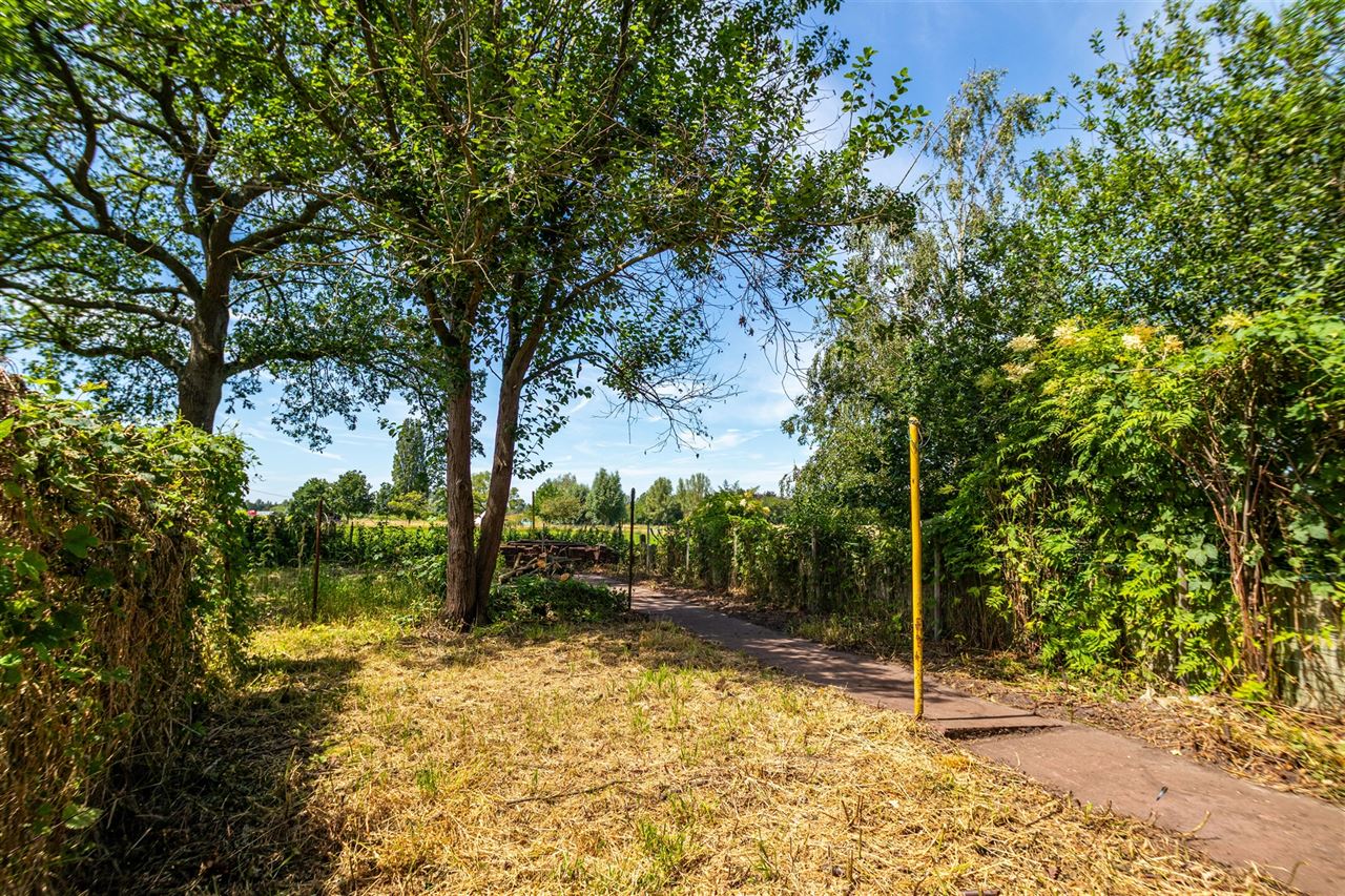 Statige woning met vrij uitzicht & vergund bijgebouw