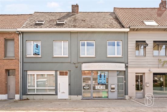 grey-building-facade-with-shopfront