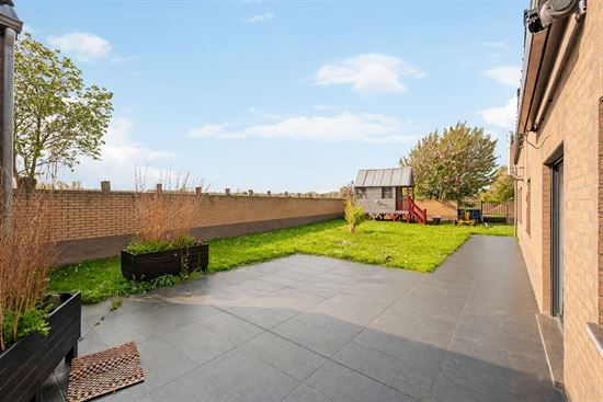 spacious-backyard-with-patio-and-lawn