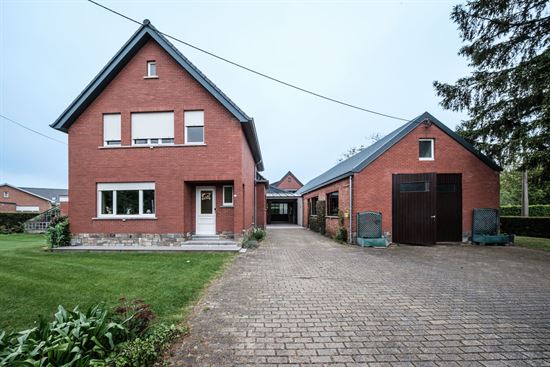 Open bebouwing met magazijn te koop