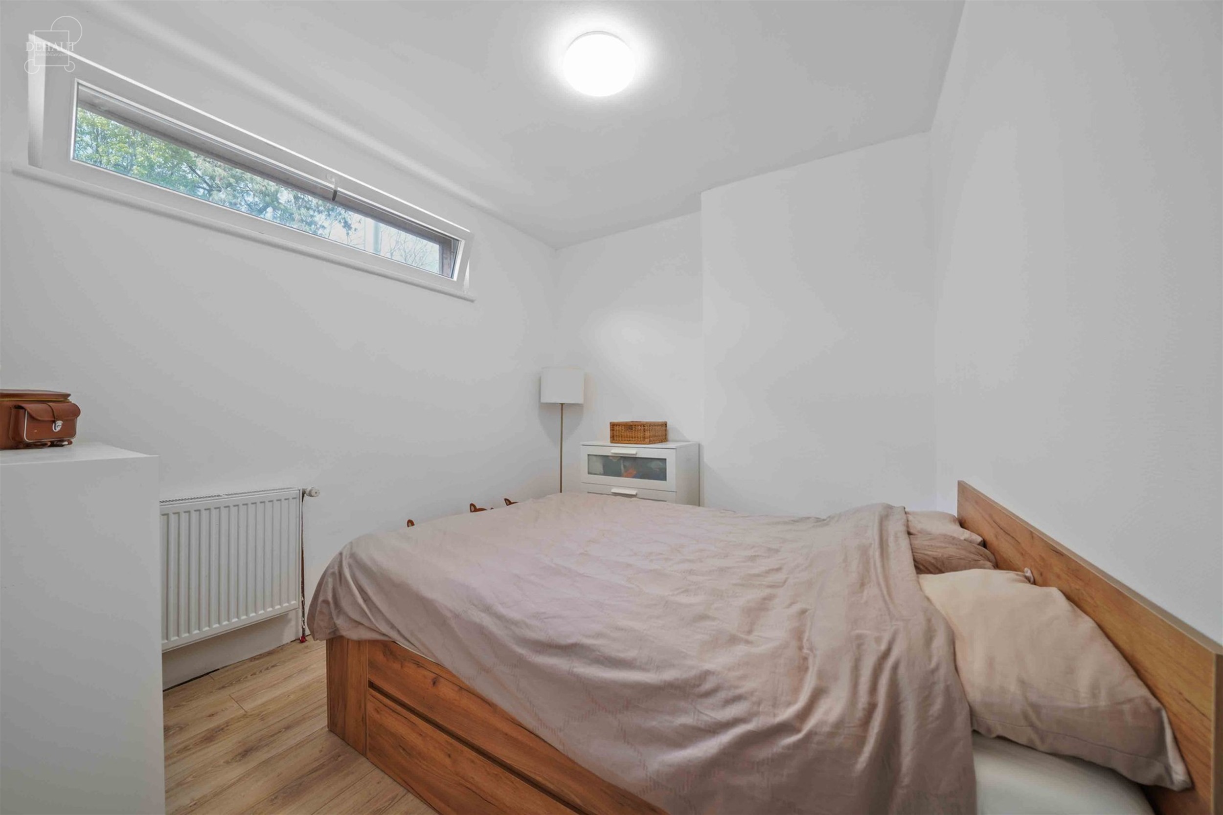 Jolie maison de ville située à deux pas de la Lys. Se compose d'un hall d'entrée desservant un séjour, une cuisine équipée, une salle de bain, u...