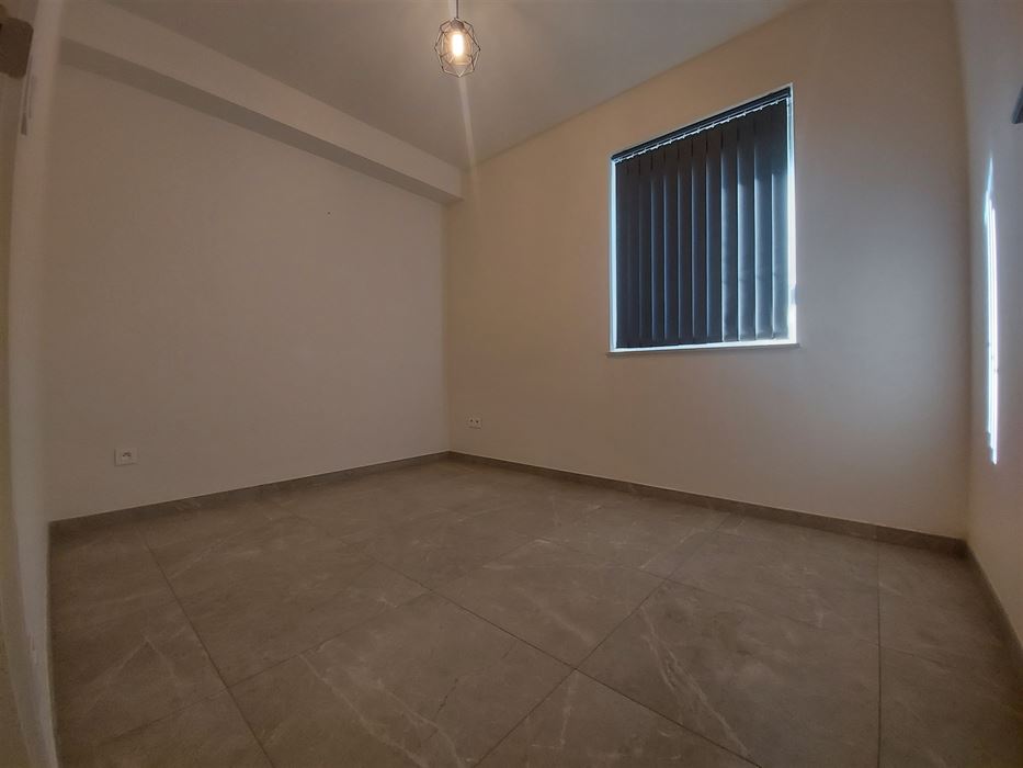 Gelijkvloers appartement met 2 slaapkamers