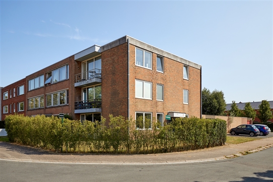 Appartement met privatieve tuin, parkingplaats en garagebox