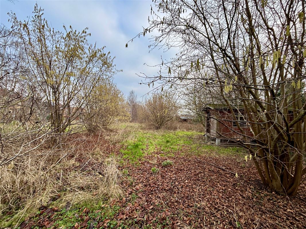 RUIME TE RENOVEREN WONING MET UITZONDERLIJKE TUIN EN VERGUND BIJHUIS OP CA. 4.410 M² TE SINT-KRUIS