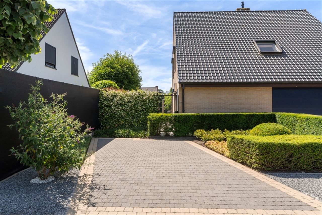 Rustig gelegen woning met tuin en dubbele garage
