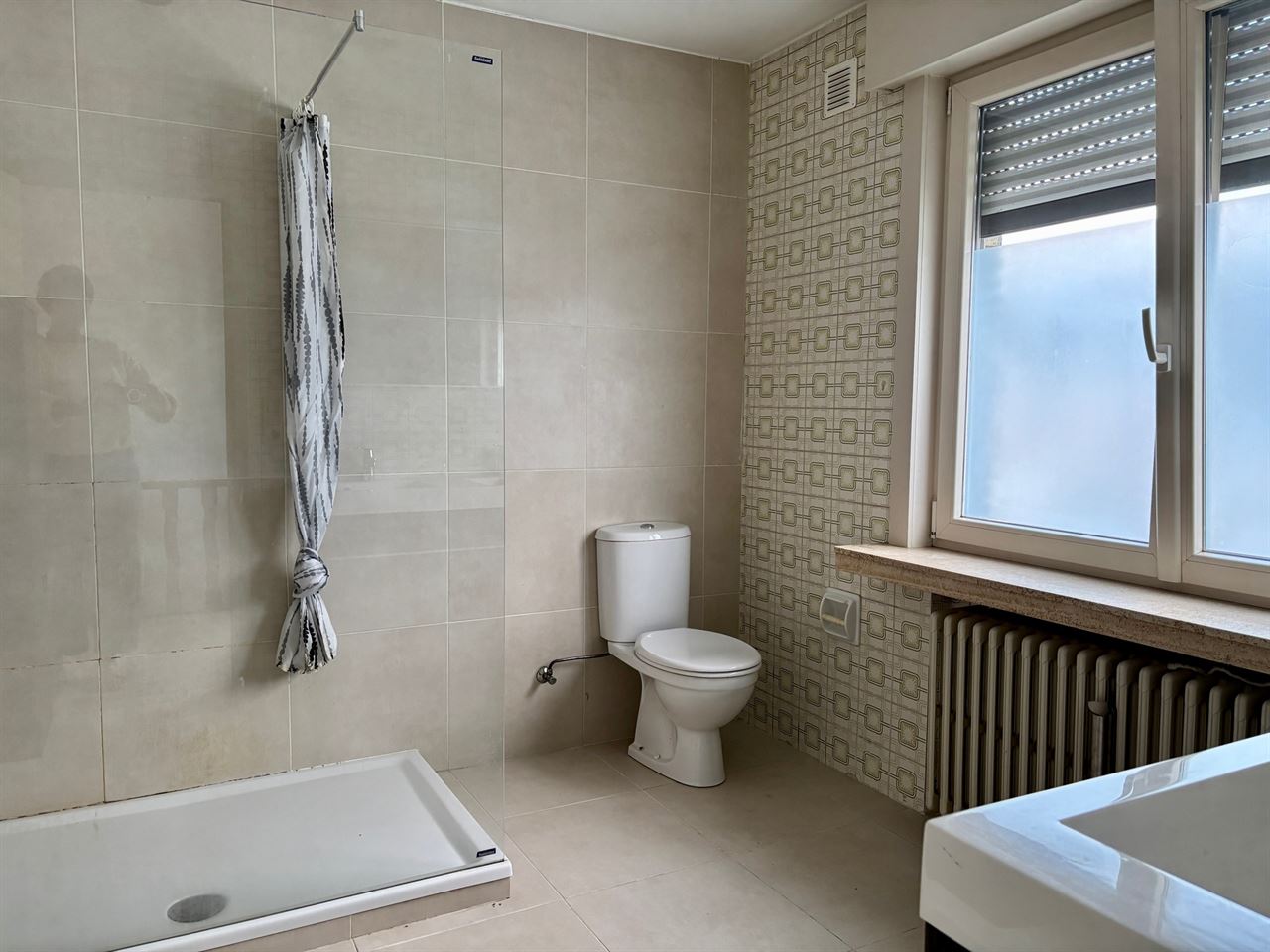 Instapklare rijwoning met 3 slaapkamers, tuin en garage
