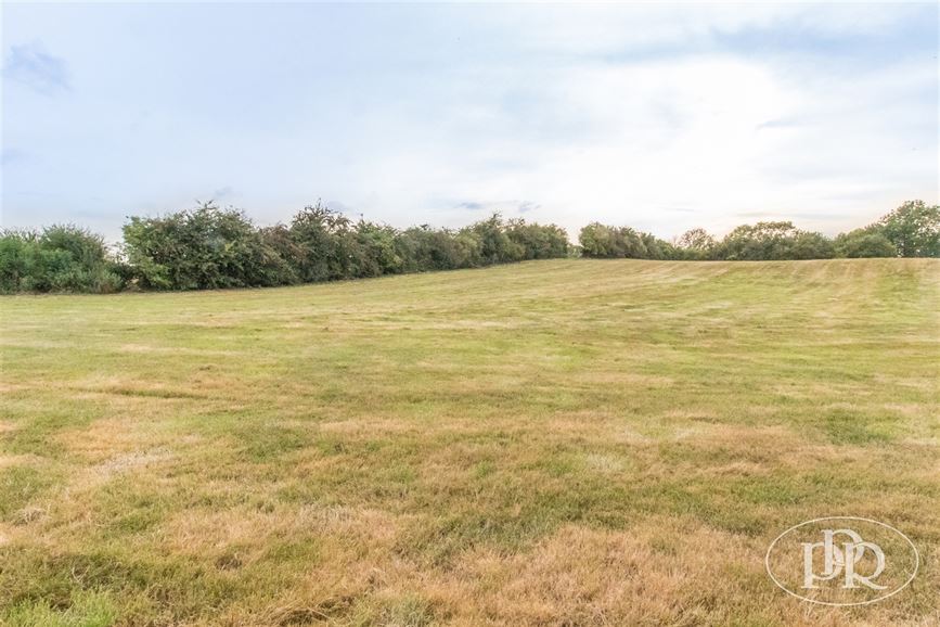 TERRAIN oriénté Sud-Ouest de ± 61,93 ares