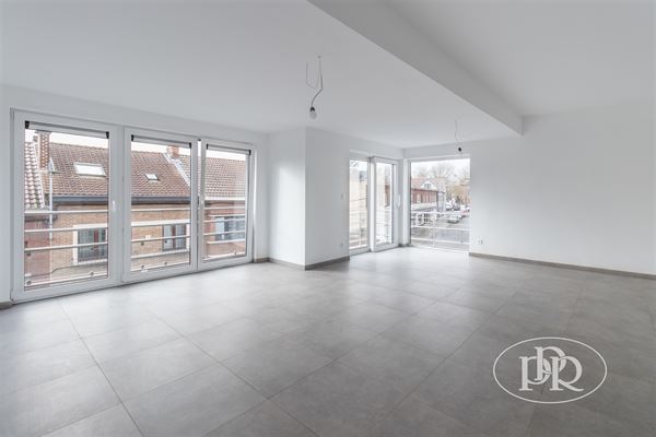 *** VERHUURD *** NIEUW APPARTEMENT met 1 slaapkamer ± 69 m² met parkeerplaats, kelder en gemeenschappelijke tuin