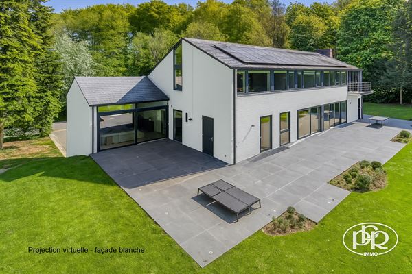 Angoussart : Prestigieuse villa d’architecte de ± 534 m² rénovée en 2012, sur un terrain de ± 39,20 ares.