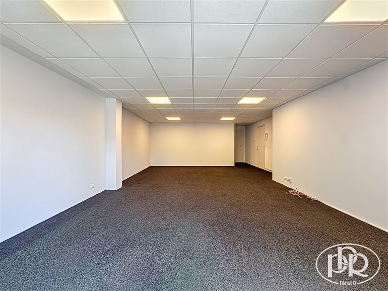 1er étage centre ville, parking face à l'immeuble