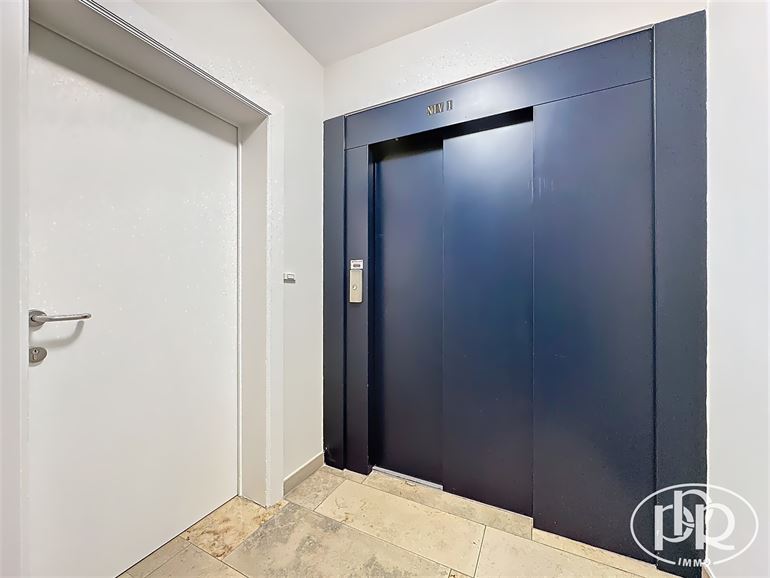 1er étage centre ville, parking face à l'immeuble