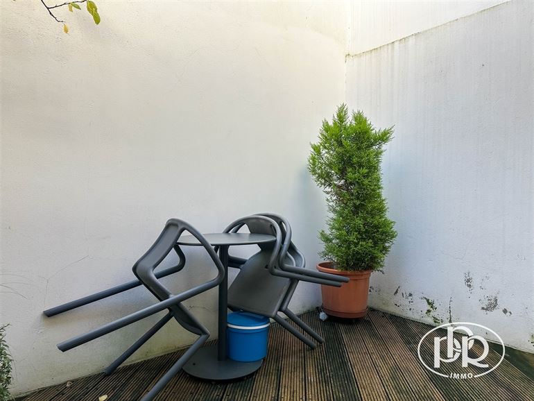 Poss. appartement + commerce
