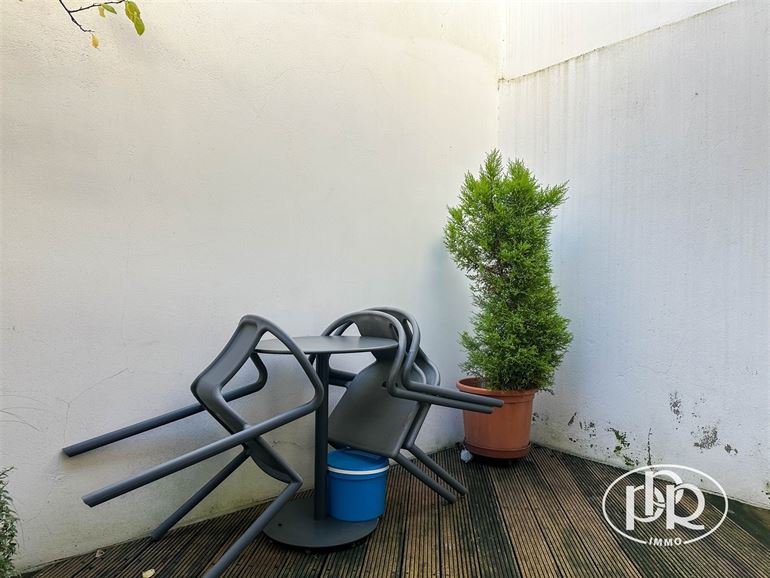 Poss. appartement + commerce