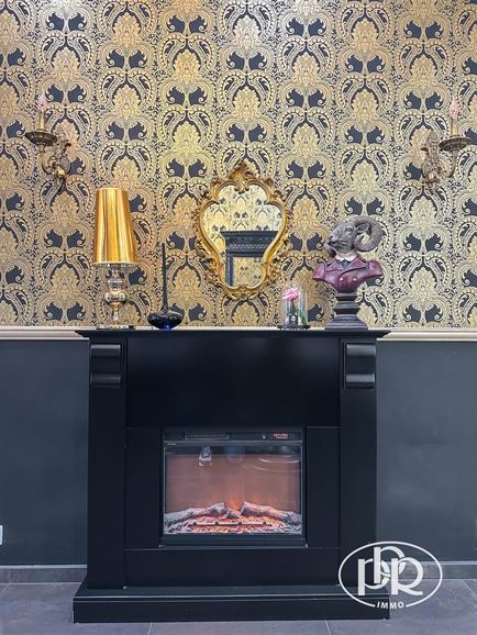 Poss. appartement + commerce