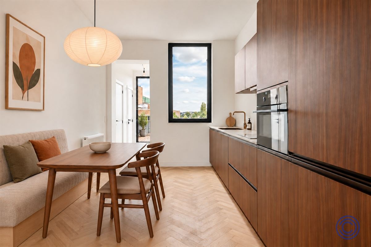 Stijlvolle duplex met zonnig dakterras in Berchem!