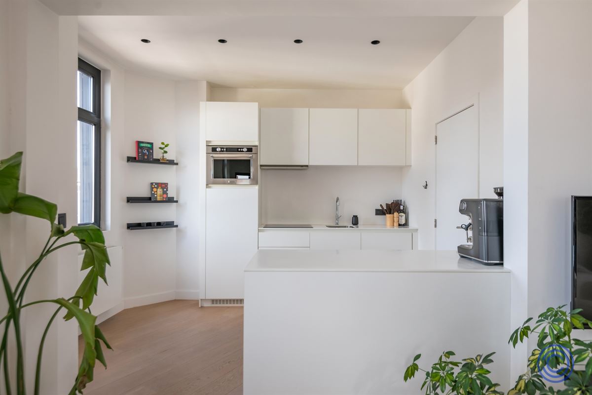 Bright city apartment with custom features and a unique view of Mechelseplein