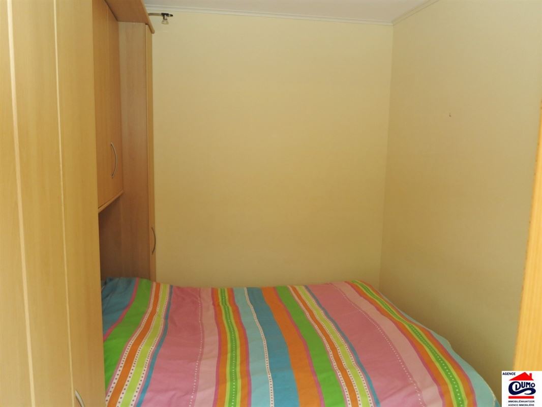 Gemeubelde studio met slaaphoek