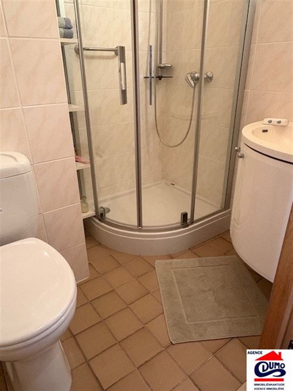 Piekfijn ingericht appartement met 1 slaapkamer met zeezicht en private garage op wandelafstand